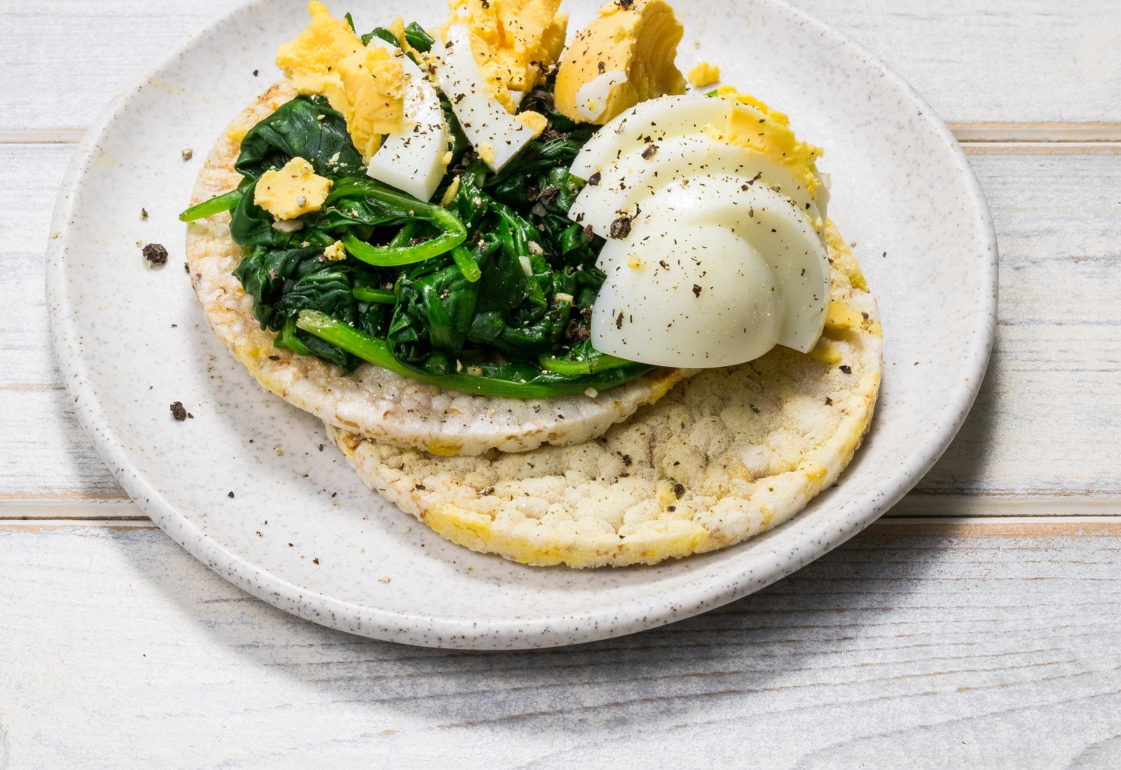 Saute Spinach & Garlic with Boiled Egg on CORN THINS slices
