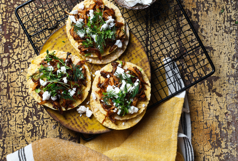 Smokey Pulled Mushroom with Goat's Cheese & Herbs on Corn Thins slices